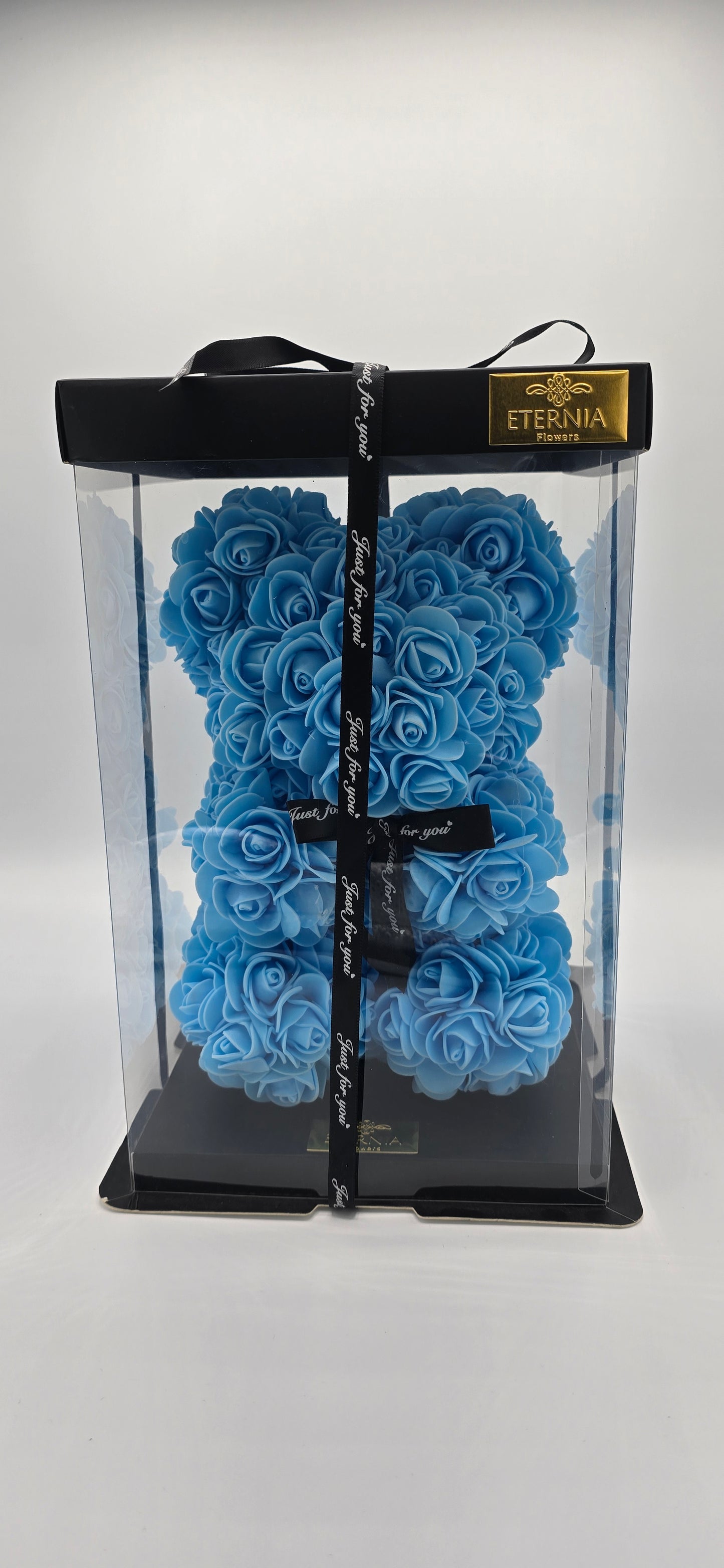 Nounours avec petites roses bleues – L'Alliance du Charme et de la Douceur